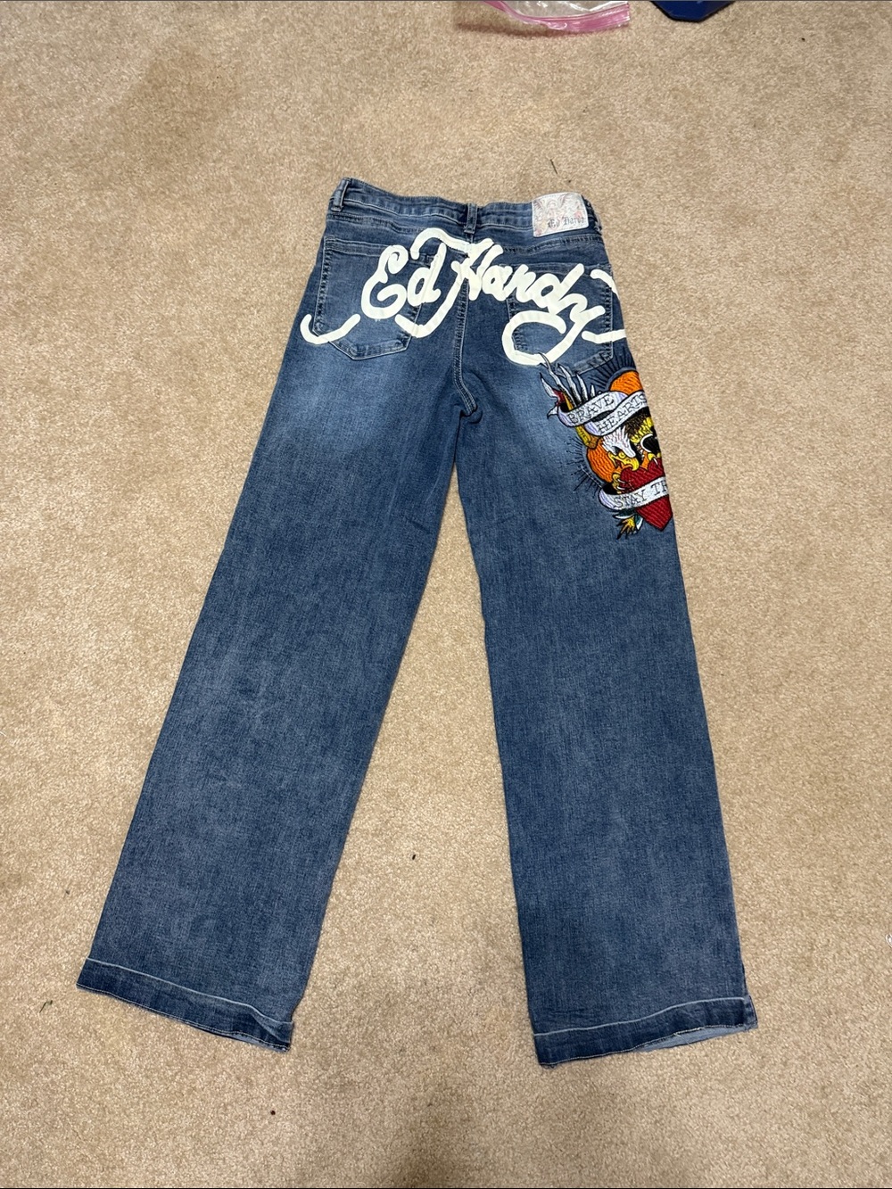 Ed Hardy Blue Denim Bootcut Jeans with White Script and Colorful Tattoo Graphic
